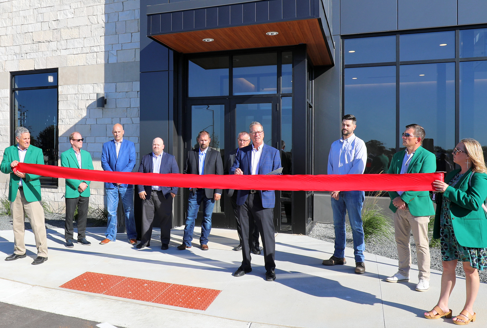 Greystone Construction CEO Kevin O'Brien speaks at Ribbon Cutting hosted by Shakopee Chamber